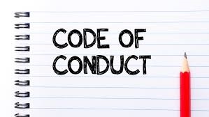 Image of notebook paper with the text:  Code of Conduct.