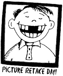 Black and white image of a boy with a big smile missing his two front teeth.